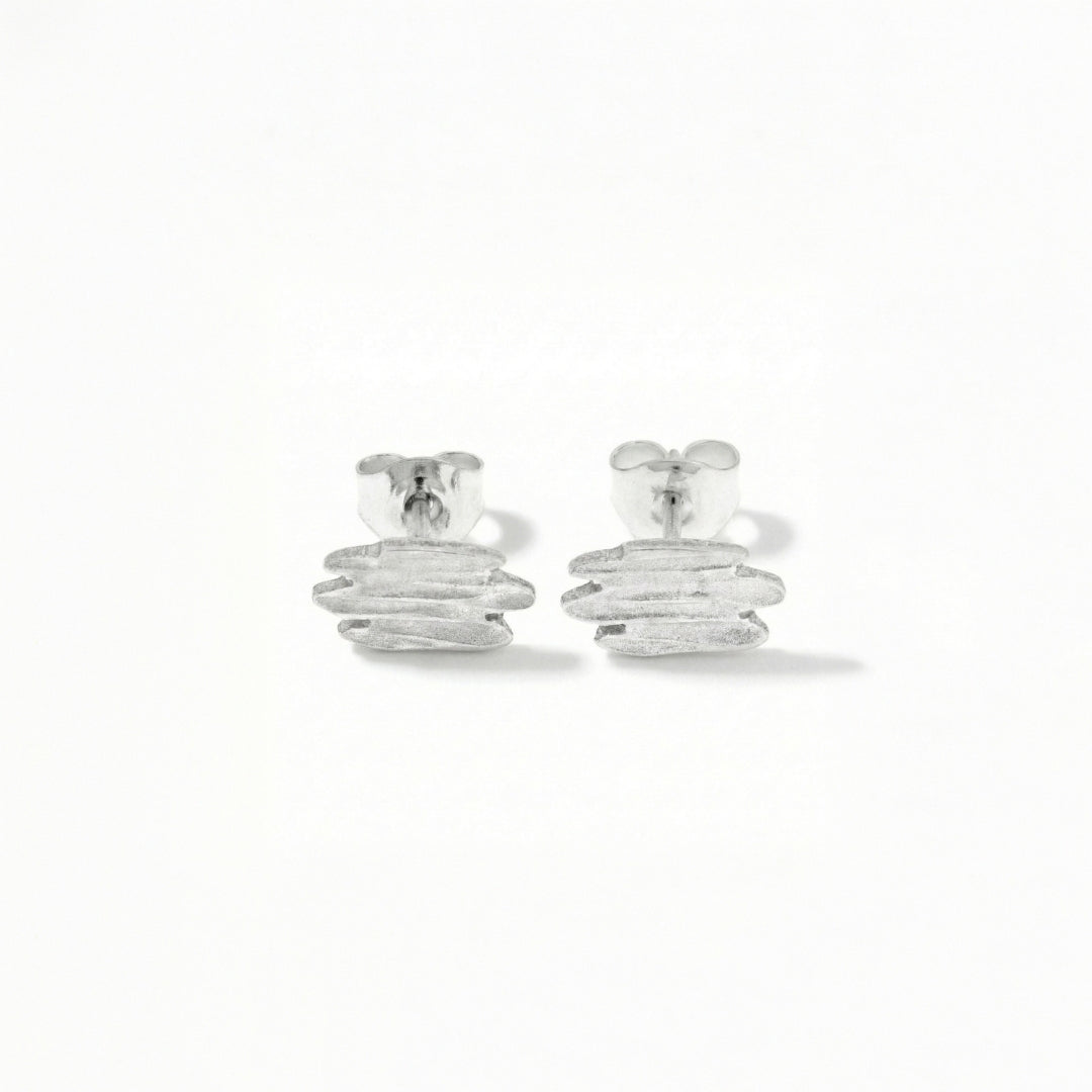 ALANDICA örhängen på stift i 925 sterlingsilver med staplade skivor