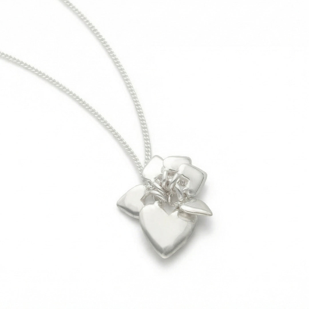 Sterling silver heart pendant with flower motif on a 42 cm chain