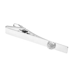 Silver golf ball tie clip with a textured dimpled ball at the end