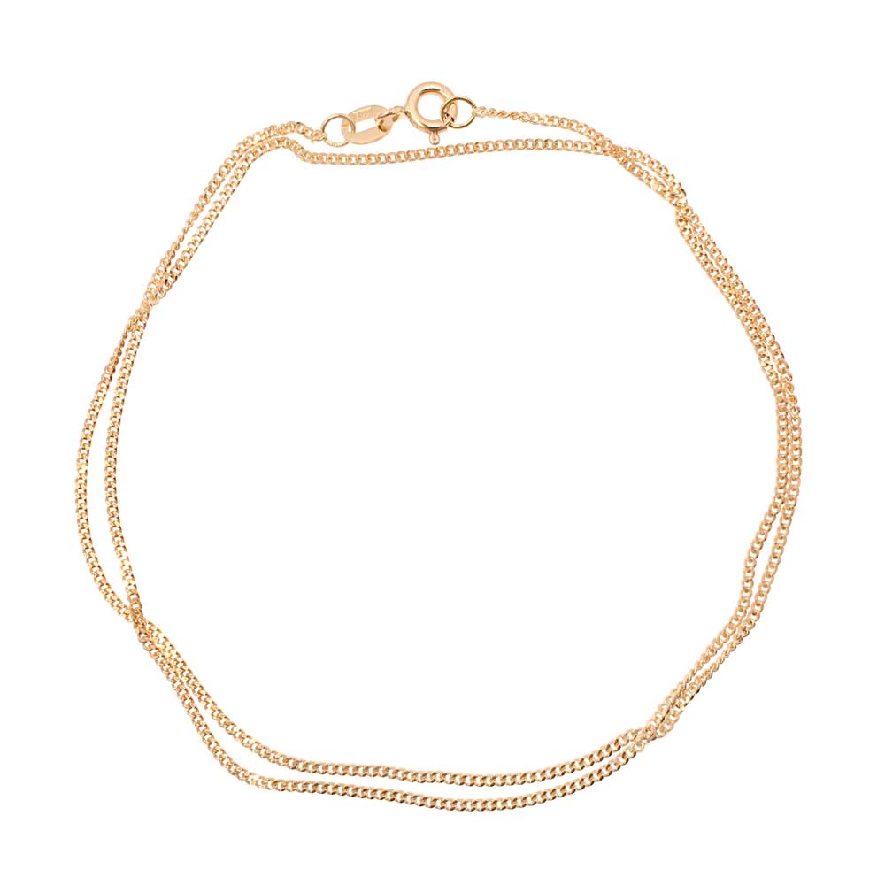 18K gold curb chain. Available from GULDVIVA.