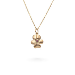 18K guld halsband med violformad blom och granat i mitten
