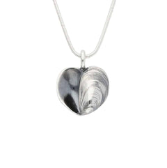 Silver two tone heart shaped pendant with shell motif on a snake chain necklace