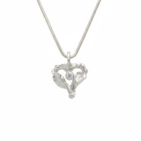 Silver heart shaped pendant with a central cubic zirconia gem